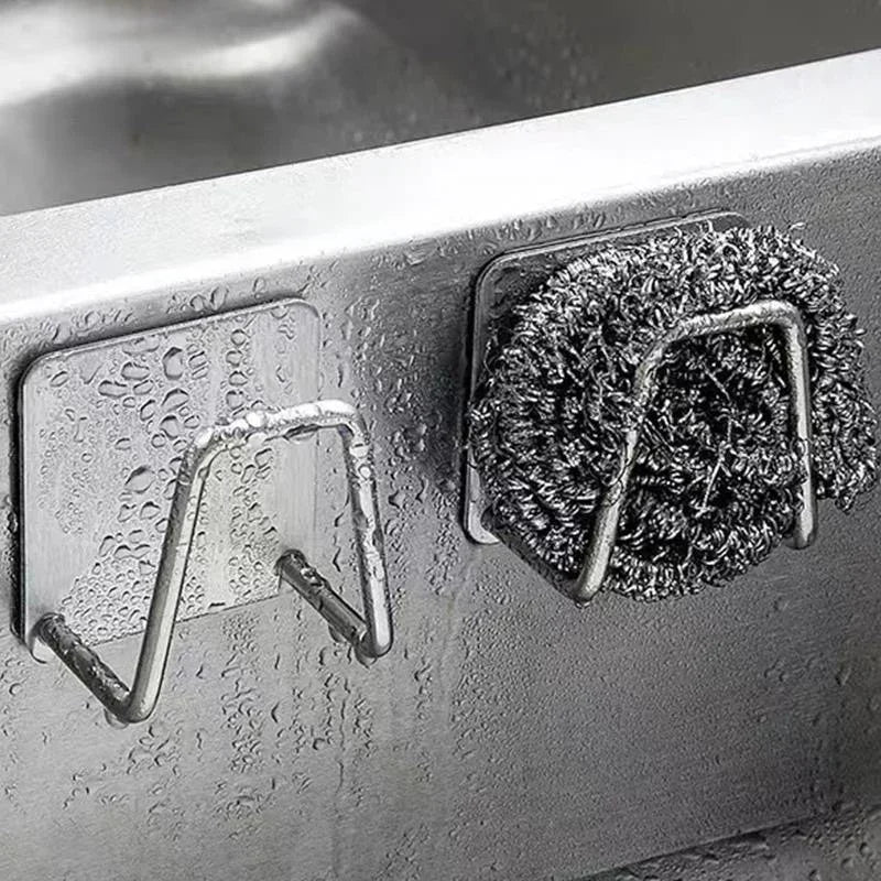 Support éponge inox autocollant fixé sur évier de cuisine - rangement pratique sans perçage